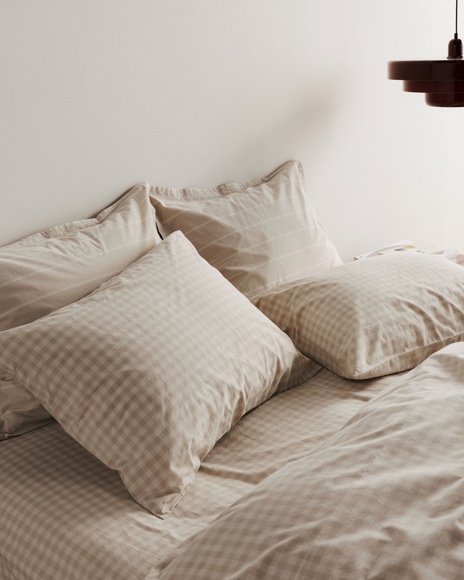 Cozy brushed cotton bedding bundle: gray check duvet cover, striped sheets, full bed view.